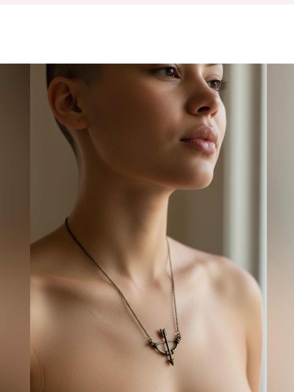 Arrow and Bow Pendant Necklace in Antique Silver Tone